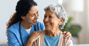 Nurse celebrating with patient who's on a value based care model